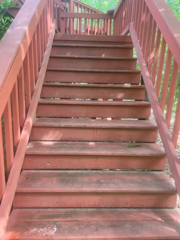 Vibrant Deck and Stairs Transformation with Pressure Washing image